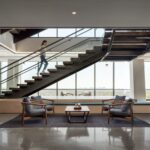 person walks up interconnecting feature stairs in enviva headquarters office