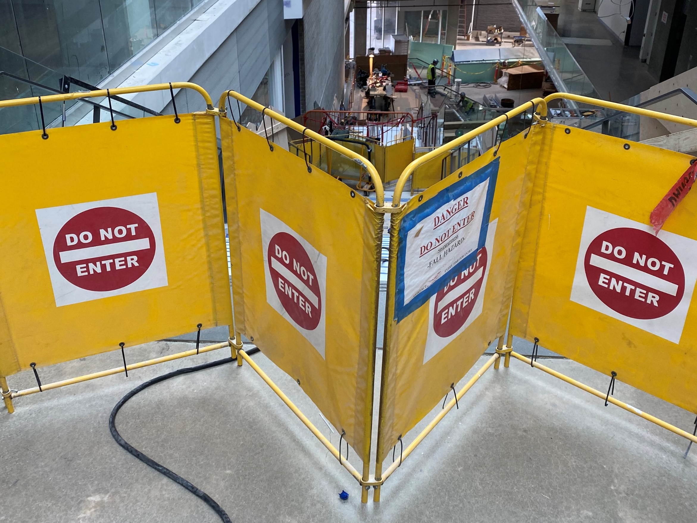 barricade blocking stair use with signage to protect from fall hazard exposure